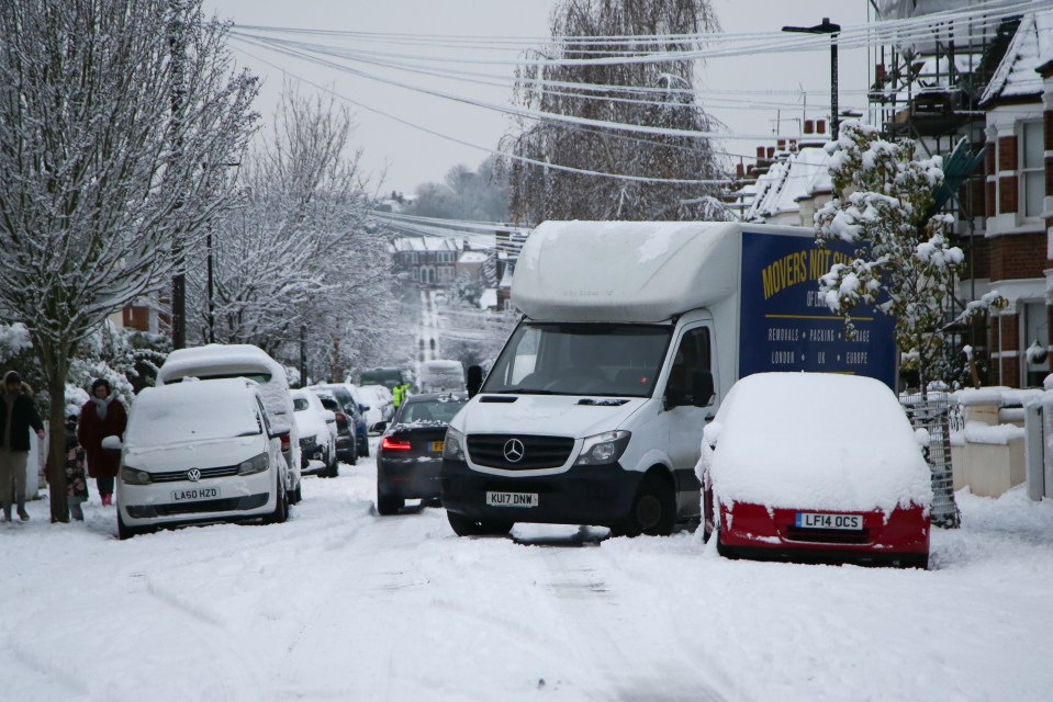 A van is stuck in the snow in north London today