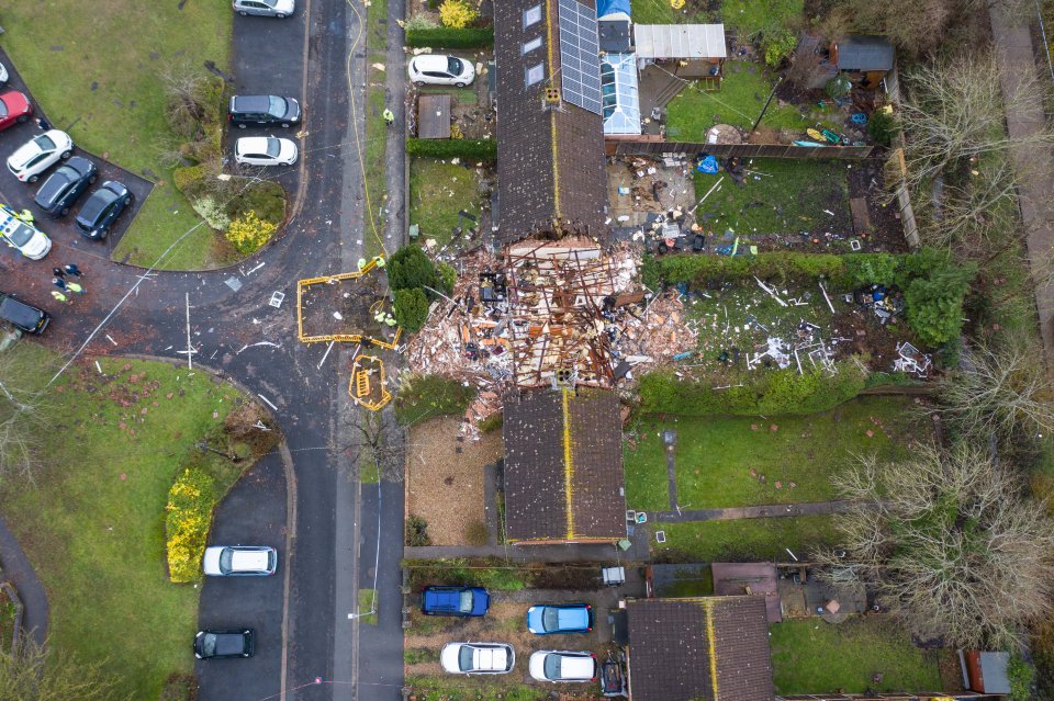 An aerial photo shows the damage to the house after a gas blast