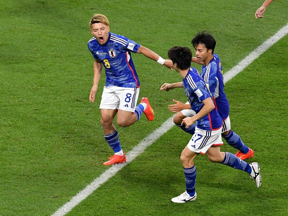 Japan topped Group E after beating Spain 2-1