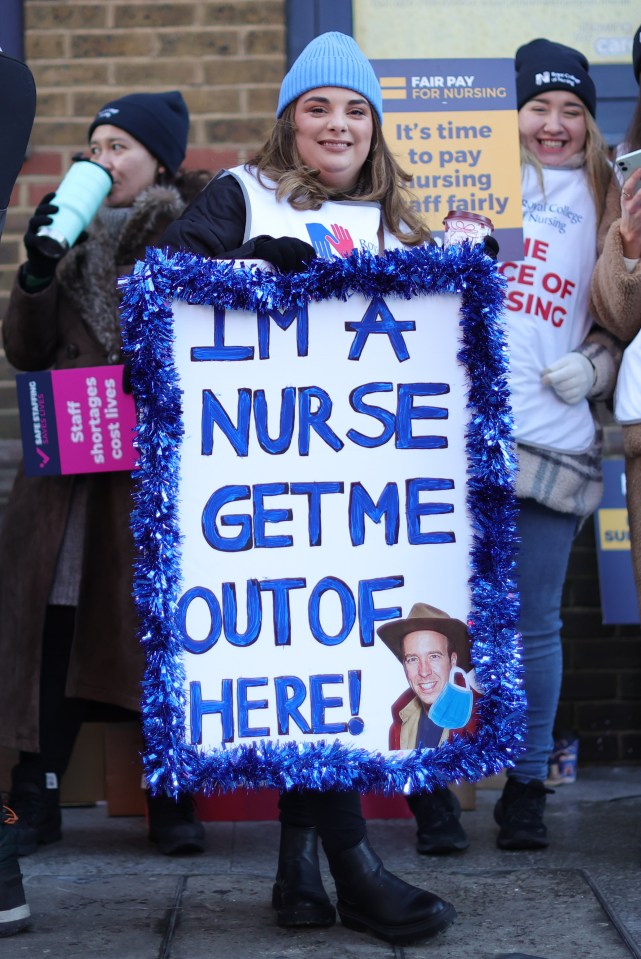 One nurse in London held up a former sign, taking a swipe at former health secretary Matt Hancock