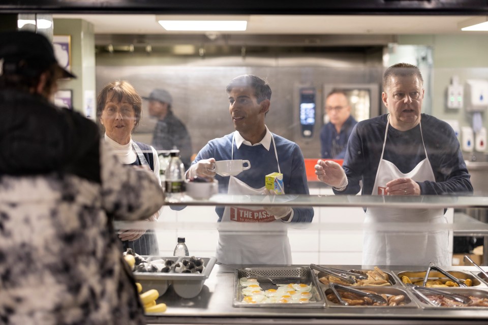 Rishi Sunak prepares and serves breakfast as he visits The Passage homeless shelter in London