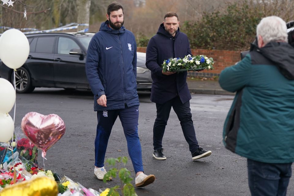 Birmingham City Football Club head coach John Eustace lay flowers today