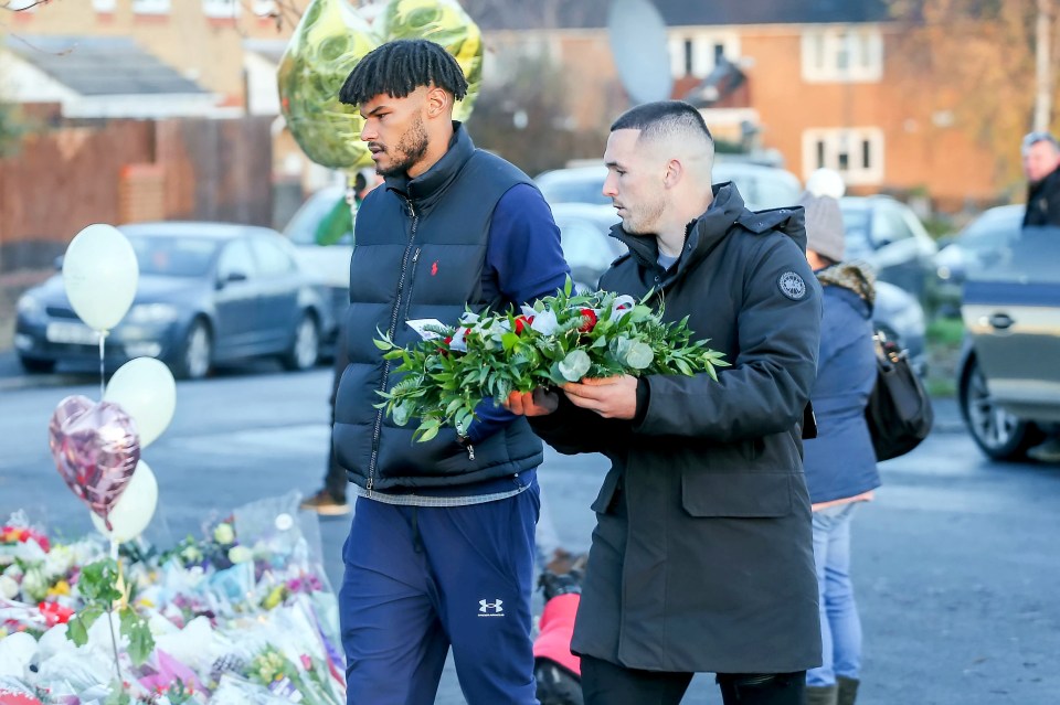 Tyrone Mings and Villa teammate John McGinn left flowers