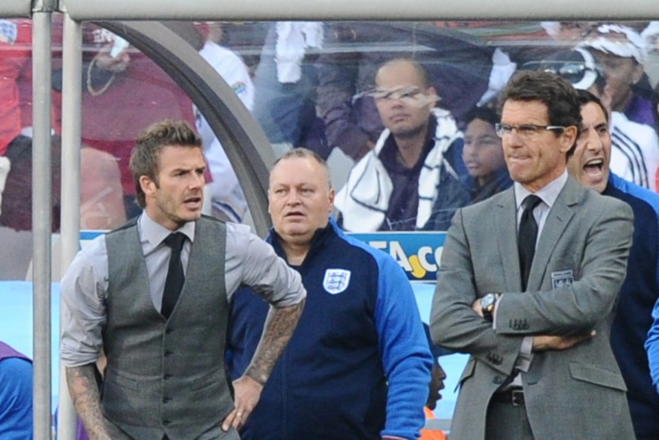 David Beckham stood alongside Fabio Capello in the dugout at the calamitous 2010 World Cup