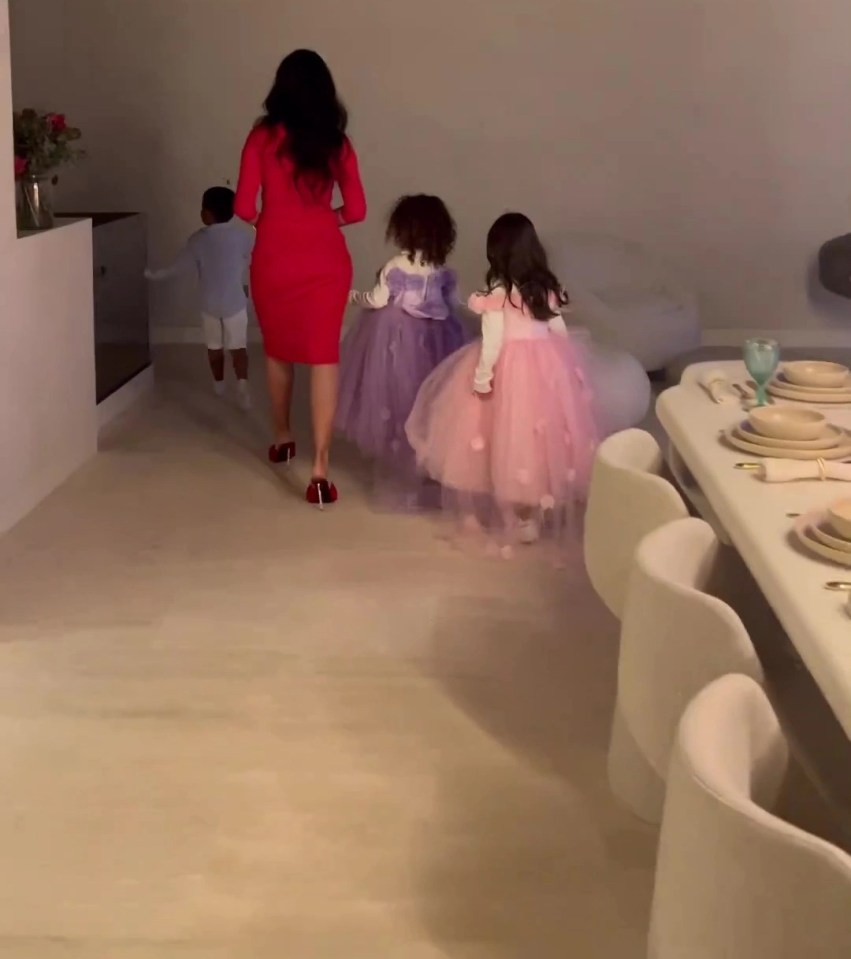 The children followed Georgina around the house