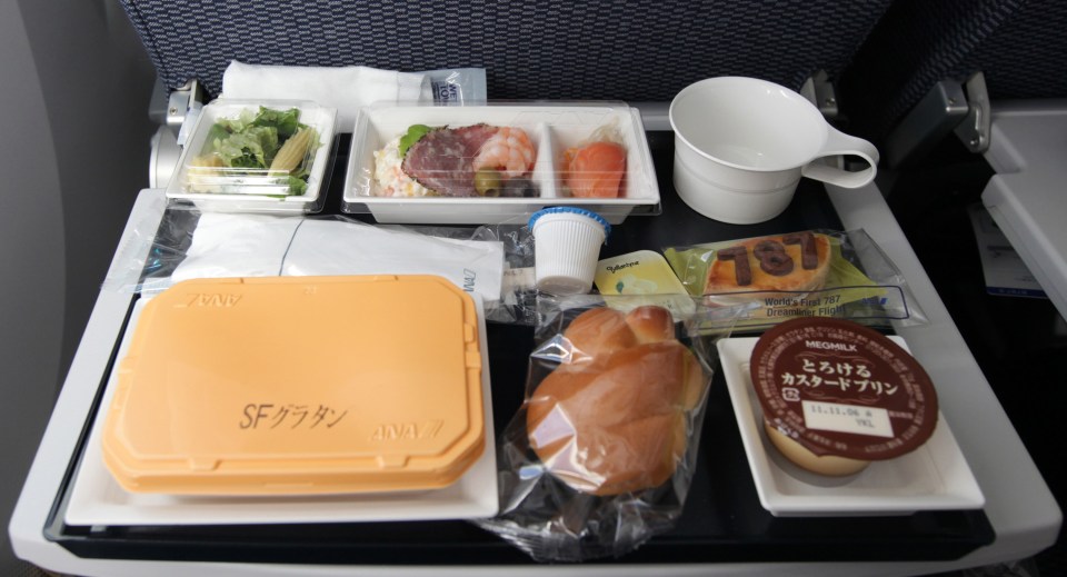 A travel expert recommends ordering "native cuisine" from in-flight menus