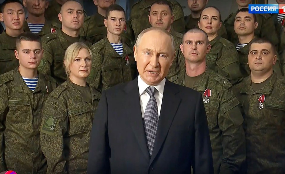 Putin gave his New Year's address flanked by soldiers