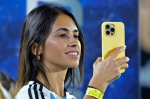 Antonela Roccuzzo watches Lionel Messi in action at the 2022 World Cup