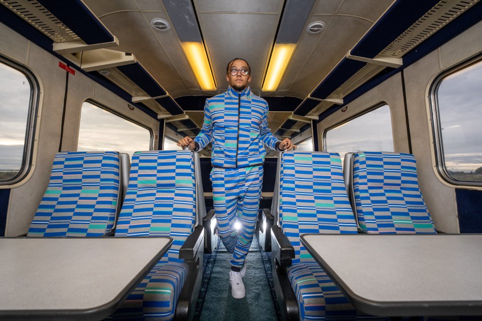 The track-suit shoot is designed to look like train seat patterns