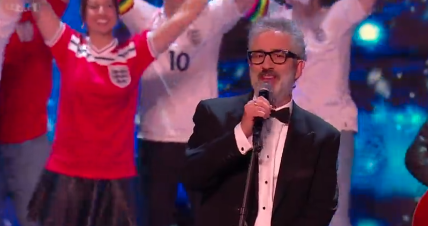 Baddiel took to the stage to perform a special festive version of Three Lions