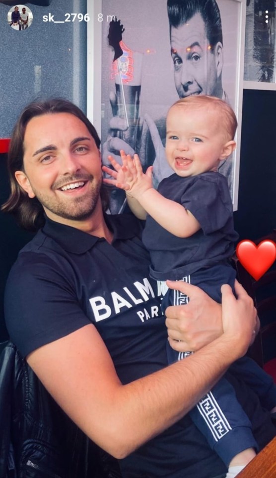 Dani Dyer's convict ex Sammy Kimmence cradles his son Santiago in a new photo