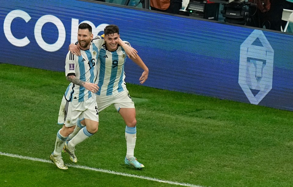 Alvarez celebrates with Lionel Messi