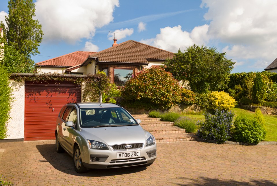 Rising interest rates on mortgages and soaring utility bills could leave drivers who have taken out a PCP deal in a 'mountain of debt' (file photo)