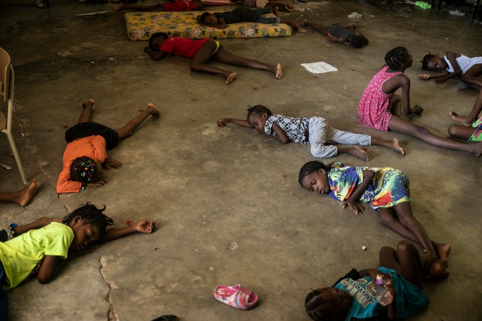 Having fled their homes to escape violence, displaced children were seen sleeping on the floor of schools likely shutdown by the summer violence