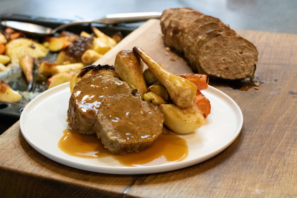 Tom’s Christmas dinner includes a tasty turkey meatloaf traybake with stuffing, roast potatoes, carrots, parsnips, sprouts and savoy cabbage topped with a rich gravy