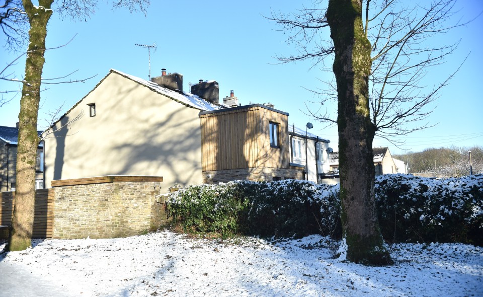 A couple in Rossendale, Lancashire have been told they have only a few weeks to knock down a brand new extension on their house