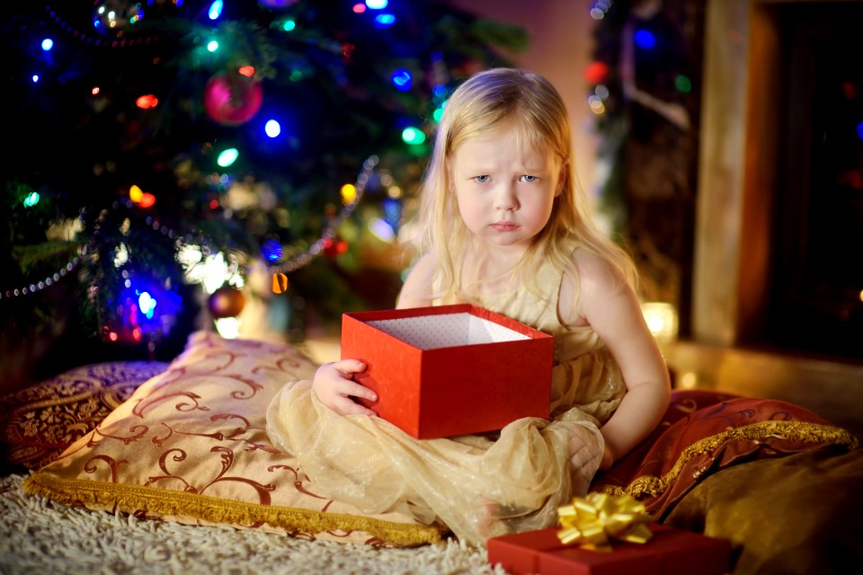 The mum makes the children ration their Christmas presents throughout the day