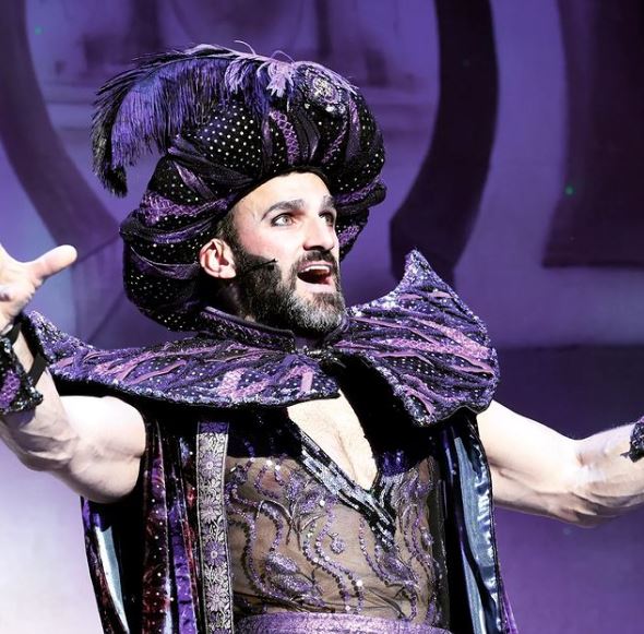 Davood Ghadami looked almost unrecognisable as he donned a purple costume for the Christmas panto