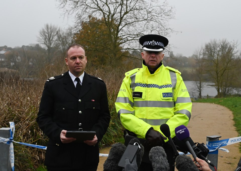 Superintendent Richard Harris, right, appeared to be emotional at a press conference today