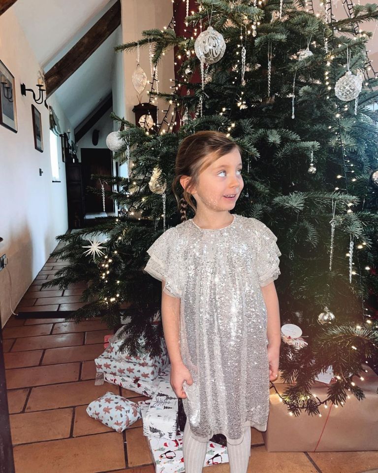 Sunday looked adorable in her sparkly silver dress