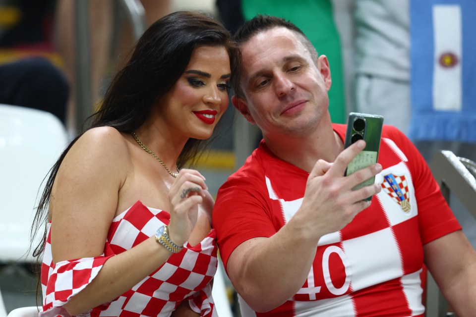 The 30-year-old poses with a fellow Croatia fan