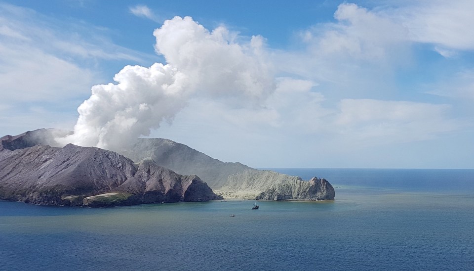 Smoke from the volcanic eruption of Whakaari, pictured from a plane