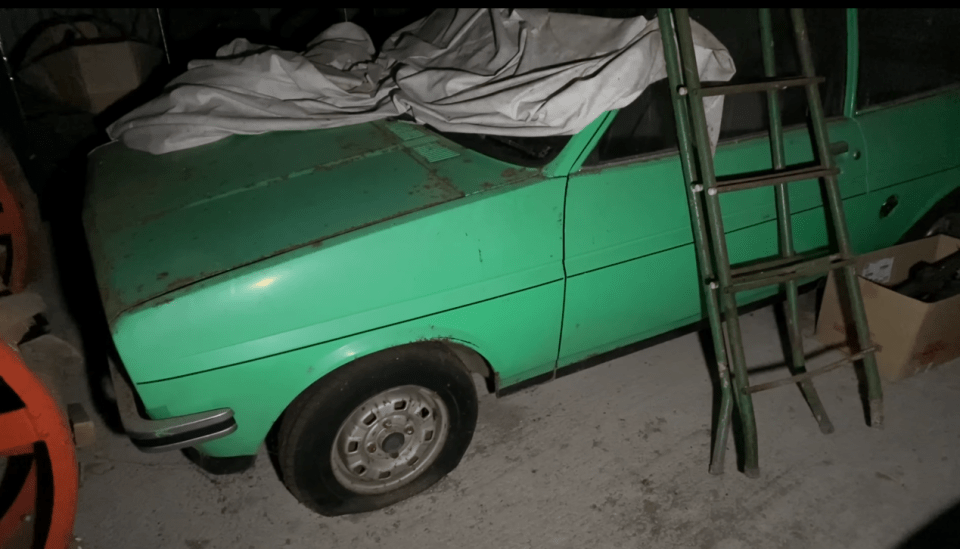 The old barn was stacked with Fords including this rare Mark I Fiesta in mint green