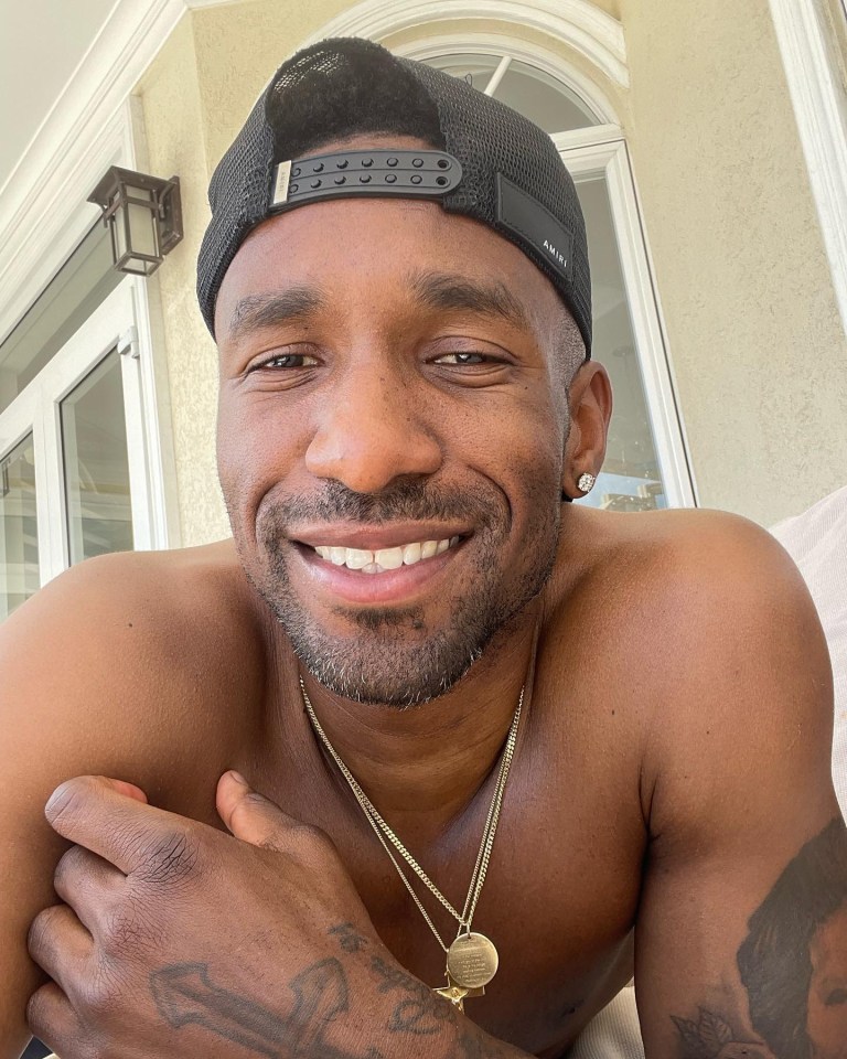 Defoe was pictured without his wedding ring while on holiday in St Lucia