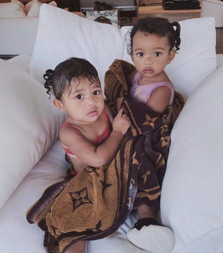 Kim sparked backlash after snaring a snap of Chicago and Stormi drying themselves with a Louis Vuitton towel