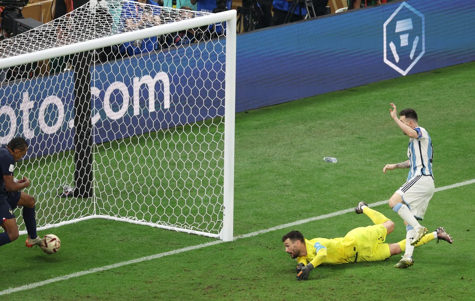 Lionel Messi squeezes his rebound over the line