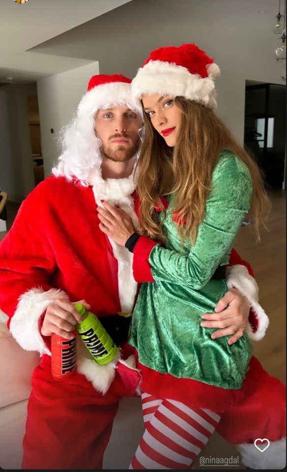 Nina was also snapped with Logan Paul in their Christmas outfits