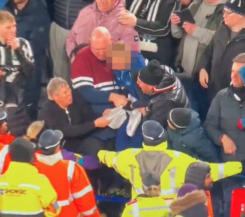 But a fan began tussling with the child for Joelinton's shirt