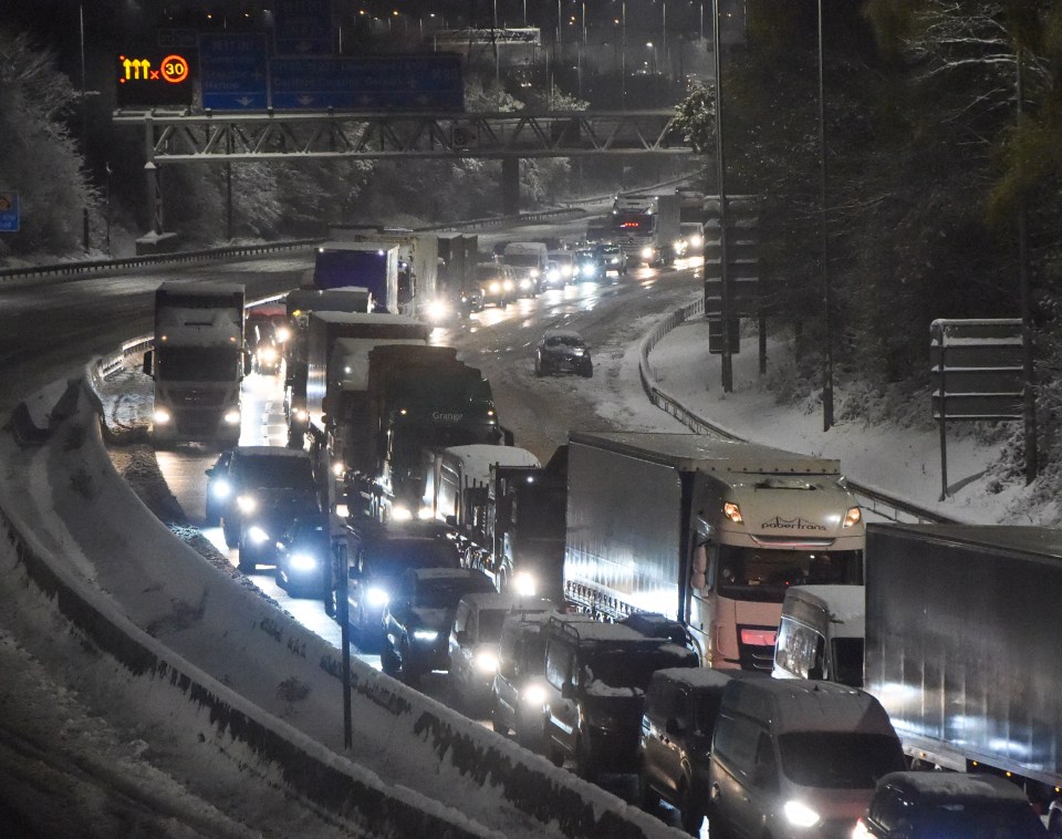 The snow caused severe delays for motorists on the M25 in Essex this morning