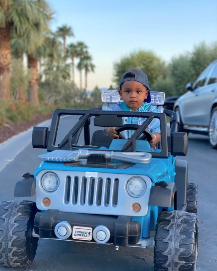 Psalm pictured in a mini Jeep gifted for his birthday