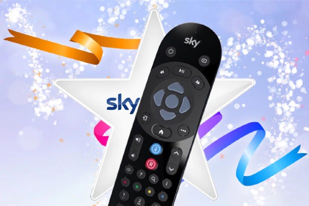 Sky TV remote control with celebratory ribbons and star.