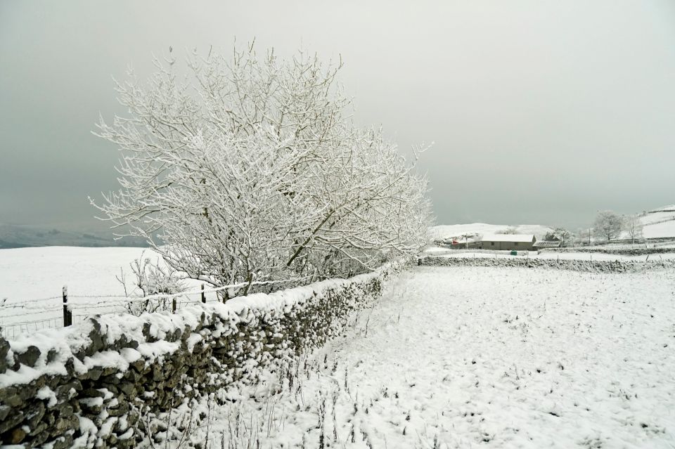 A snow covered field in the Peak District