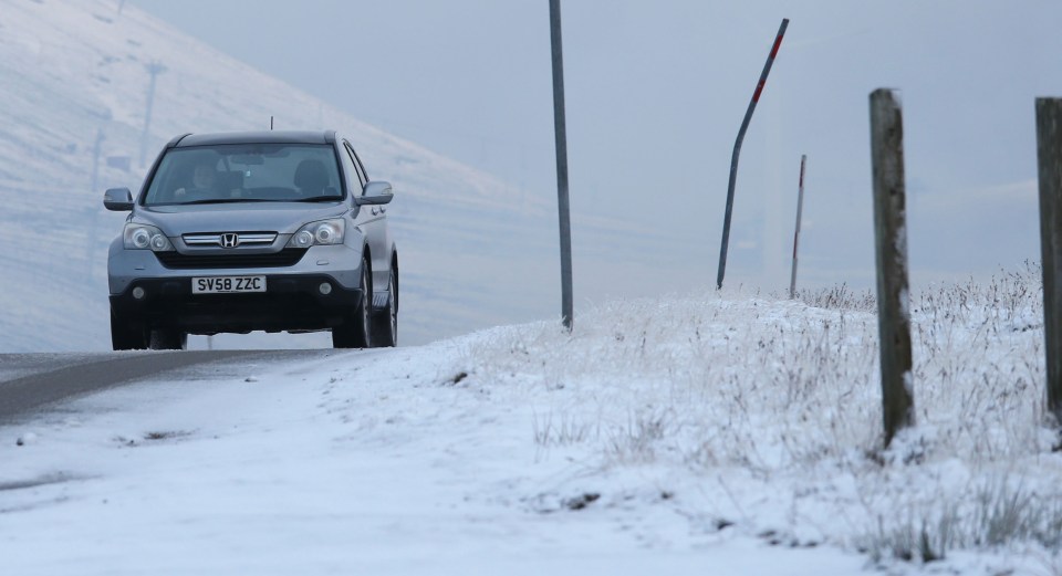 A motorist drives on the A939 in Scotland