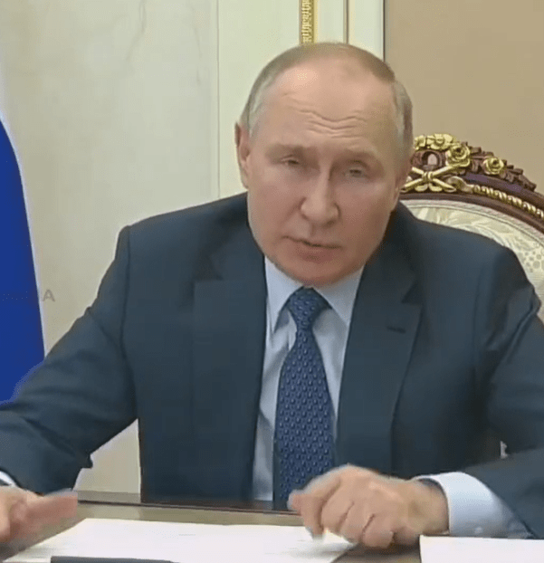 Vladimir Putin appeared swollen as he appeared on video link