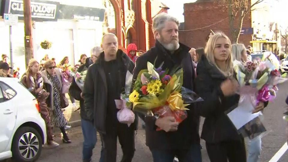 Elle's father, Tim Edwards, and other family and friends laid a floral tribute at the scene today