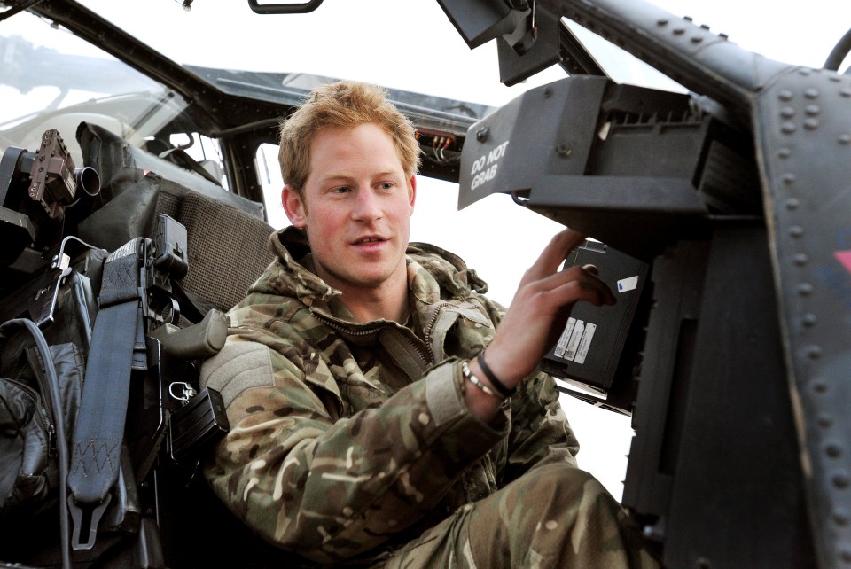 Prince Harry carrying out pre-flight checks on the flight-line from Camp Bastion