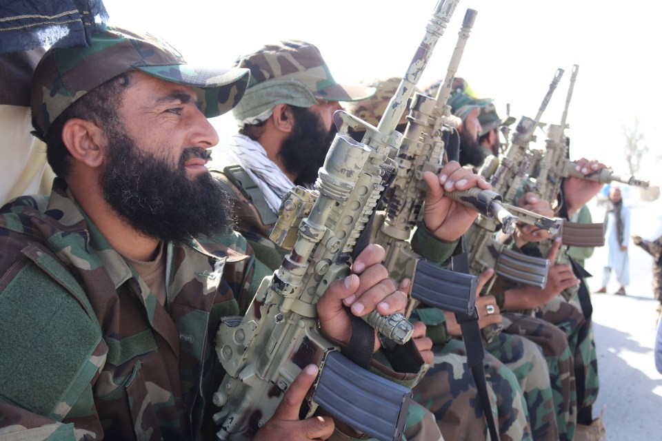 Taliban fighters wield US-made assault rifles