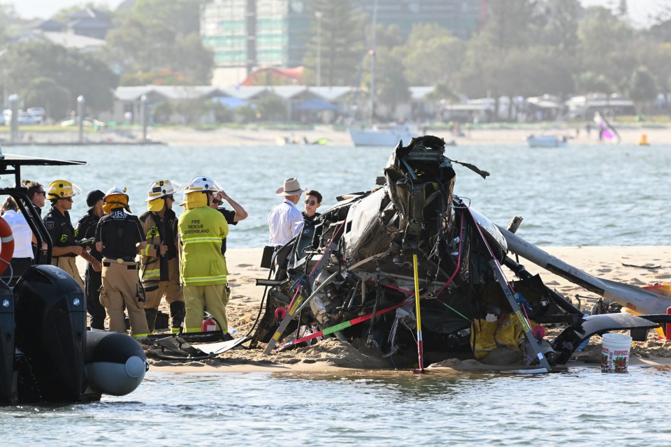 One chopper landed upside down on a sandbank