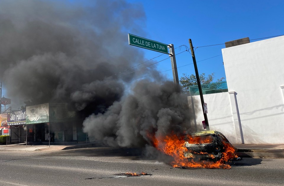 Cars have been torched amid violent clashes