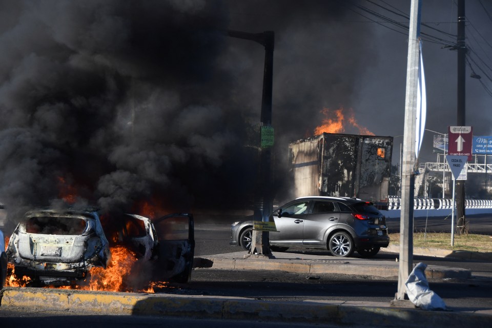 Marauding gunmen torched cars and shops and invaded an airport