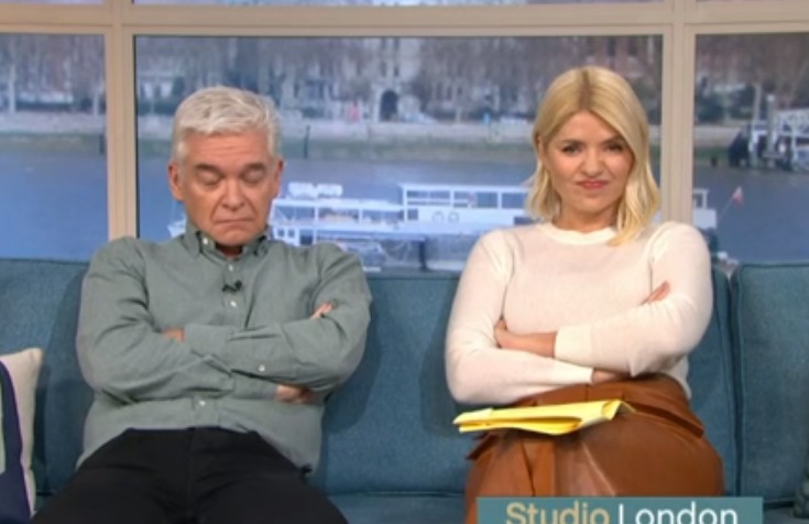 Holly and Phil were seen sulking on the sofa today