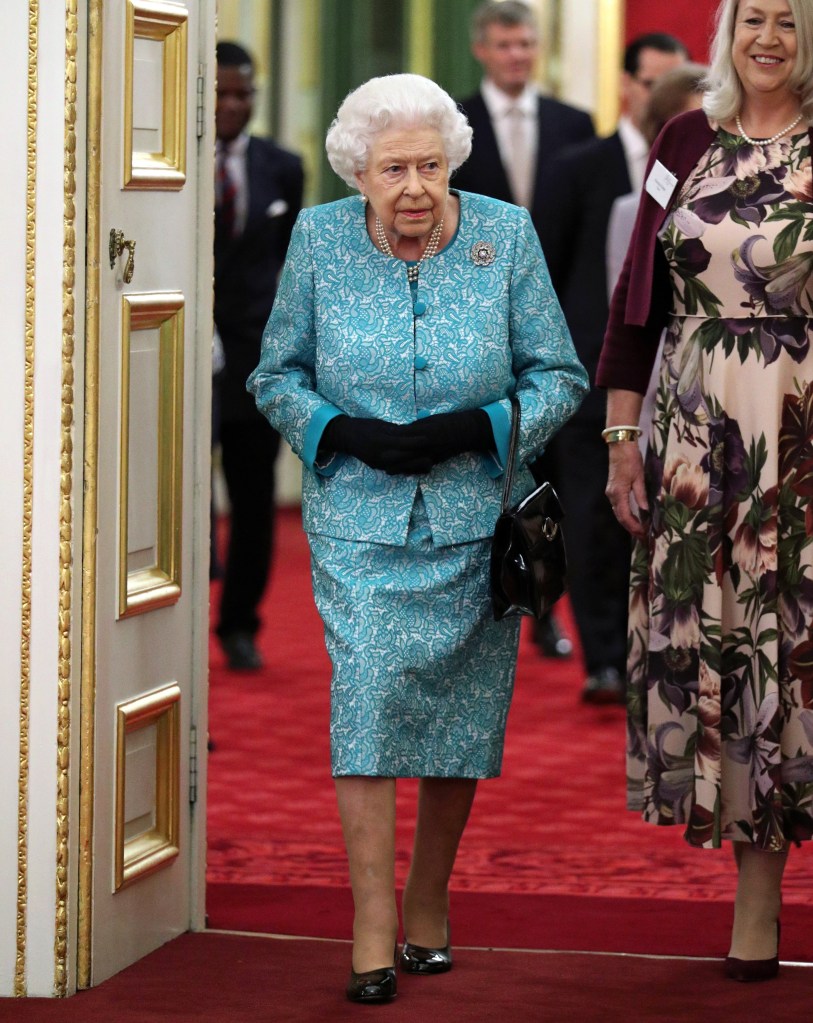 The late Queen Elizabeth seen attending a reception at St James' Palace