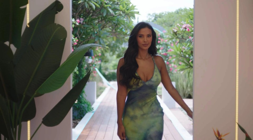 Maya greeted the Islanders in the South Africa villa in a yet-to-be available Roberto Cavalli dress