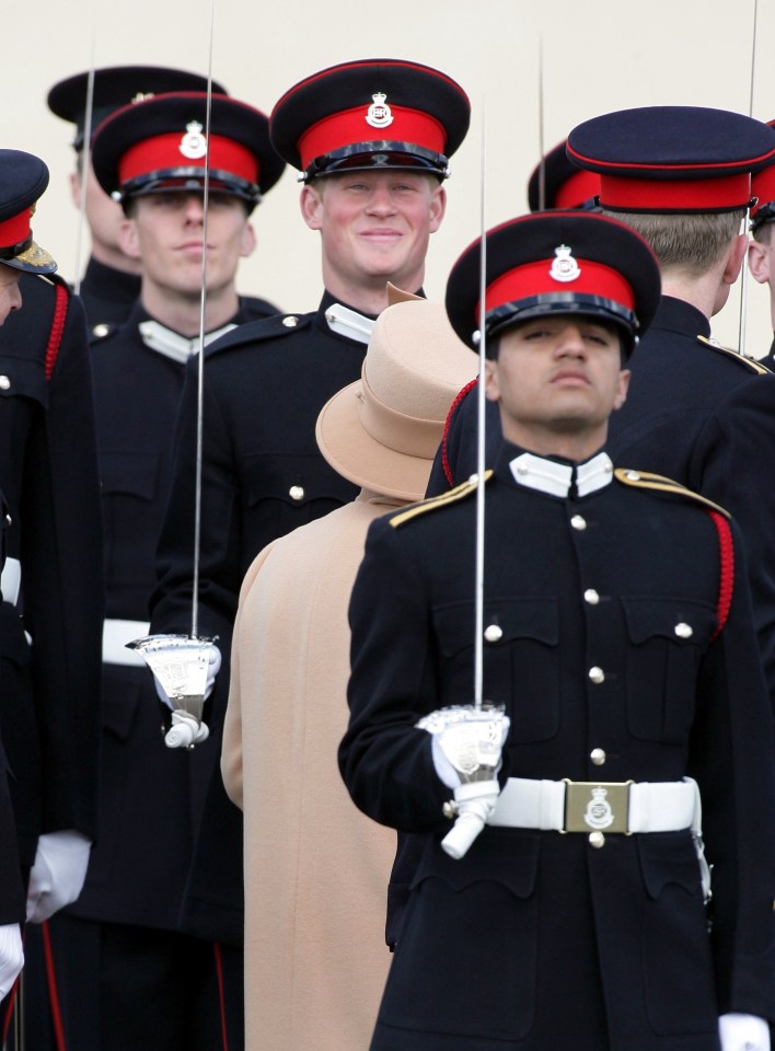 Harry used the slur when referring to Ahmed Raza Khan - pictured front row