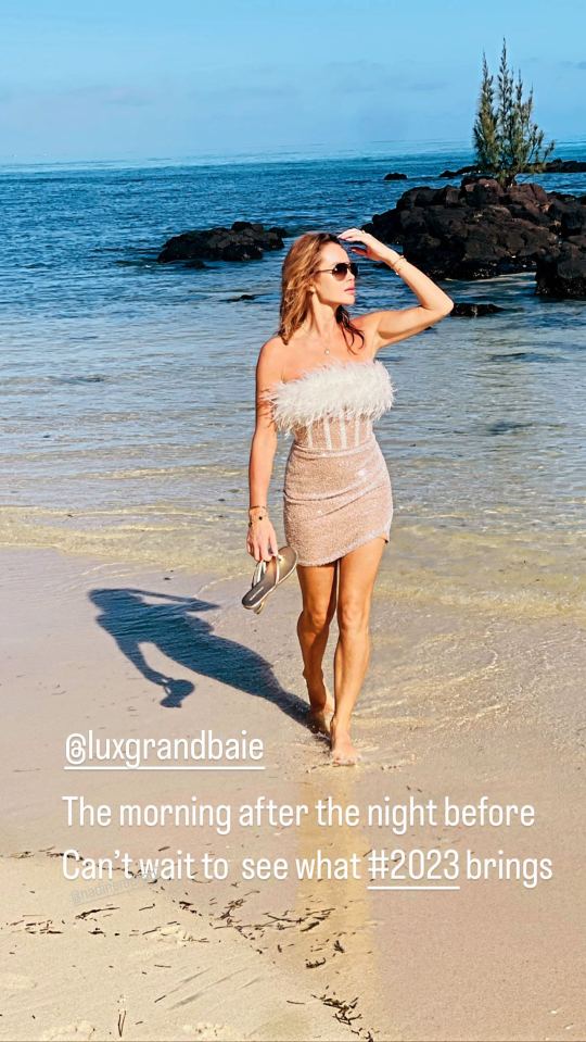 Amanda Holden posed on the beach in Mauritius after celebrating the New Year