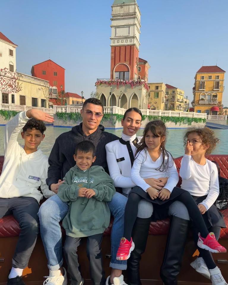 Cristiano Ronaldo and Georgina Rodriguez pose with the family on a day out